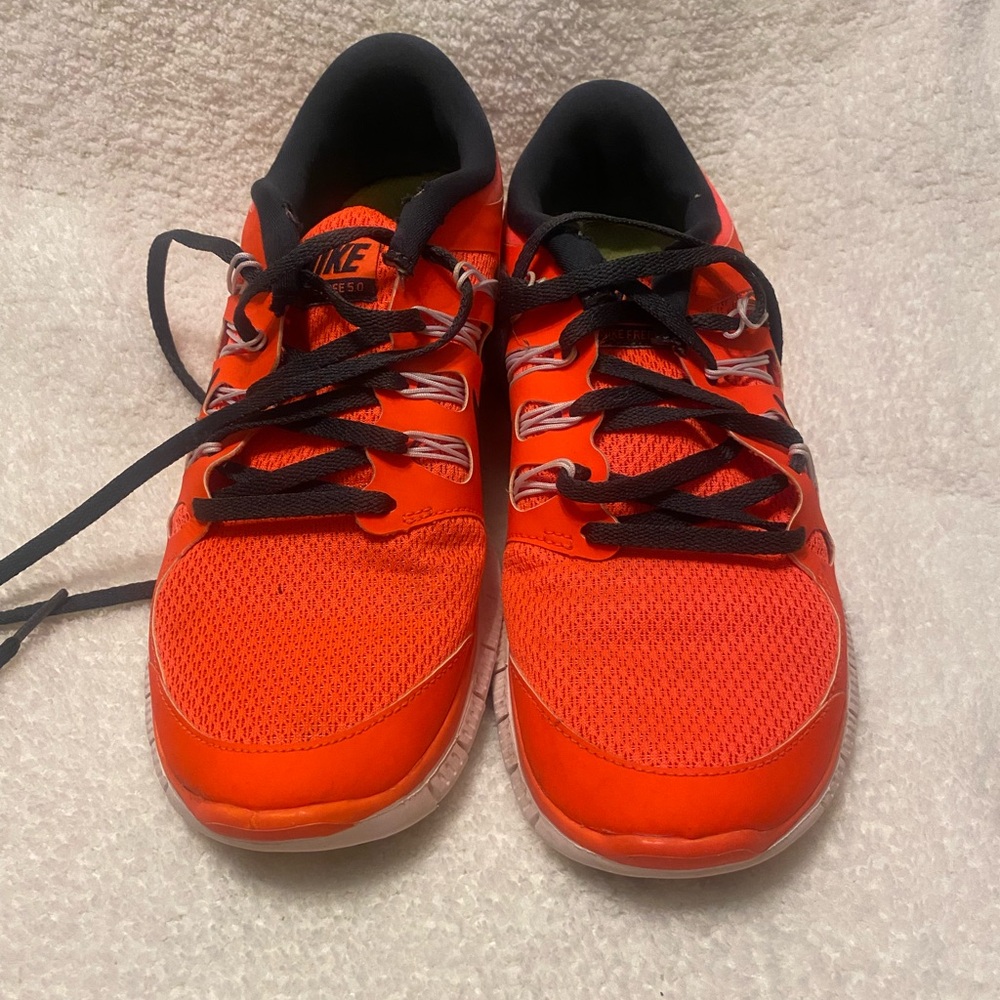 Used Bright orange size 8 Nike sports shoes